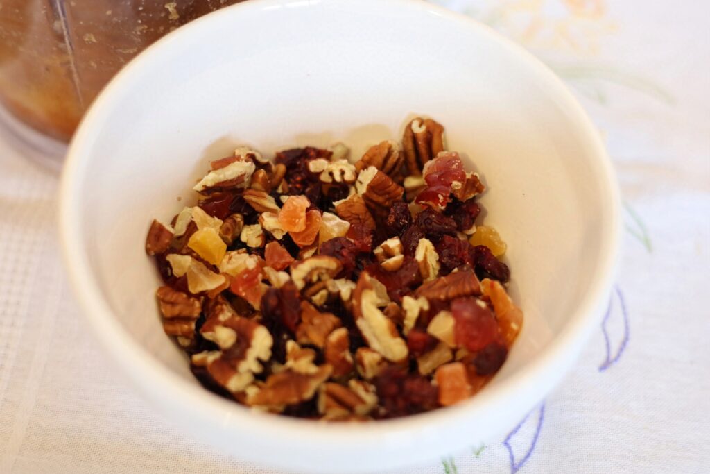 Mixed fruit and nuts containing papaya, pineapple, cranberry, glace cherries, walnuts, pecans.